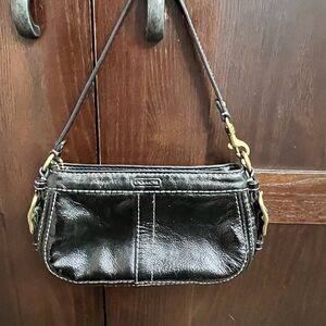 READ DETAILS Coach wristlet